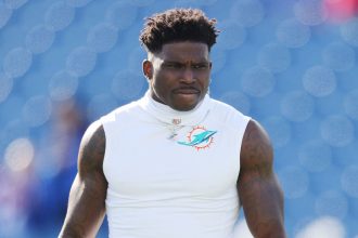 Miami Dolphins wideout Tyreek Hill warms up before a game against the Buffalo Bills at Highmark Stadium on November 3 in Orchard Park, New York.