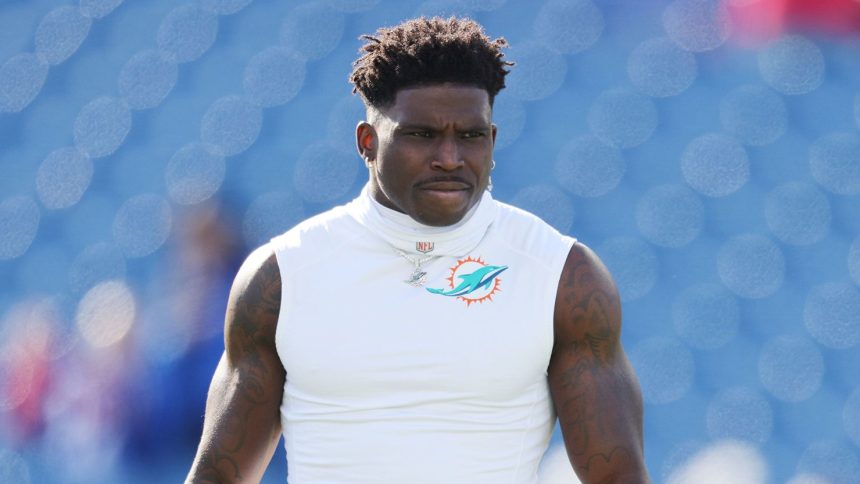 Miami Dolphins wideout Tyreek Hill warms up before a game against the Buffalo Bills at Highmark Stadium on November 3 in Orchard Park, New York.