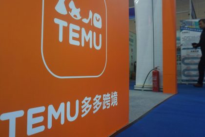 People visit the booth of Temu, the overseas platform of the Chinese e-commerce giant PDD, during an apparel trade show in Hangzhou in east China's Zhejiang province on December 5, 2024.