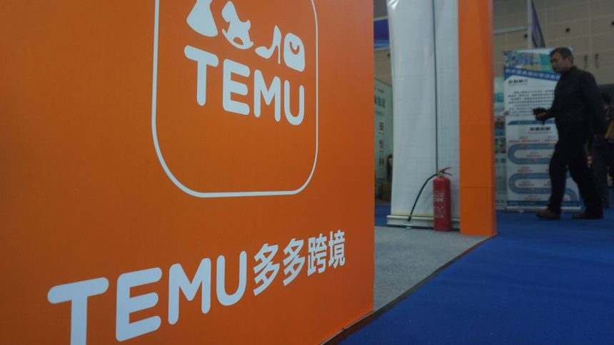 People visit the booth of Temu, the overseas platform of the Chinese e-commerce giant PDD, during an apparel trade show in Hangzhou in east China's Zhejiang province on December 5, 2024.
