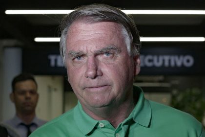 Jair Bolsonaro, pictured on arrival at Brasilia airport on March 6, 2025, was hospitalized on Friday after experiencing strong abdominal pains.