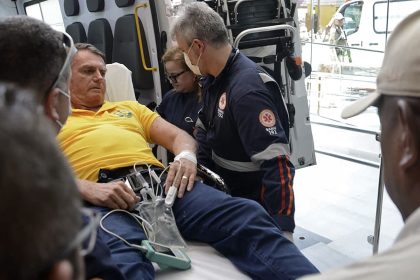 Former Brazilian president Jair Bolsonaro arrives by ambulance at the Rio Grande Hospital in Brazil on Friday.