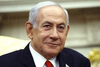 Israeli Prime Minister Benjamin speaks during a meeting with US President Donald Trump in the Oval Office of the White House, in Washington, DC, on April 7.