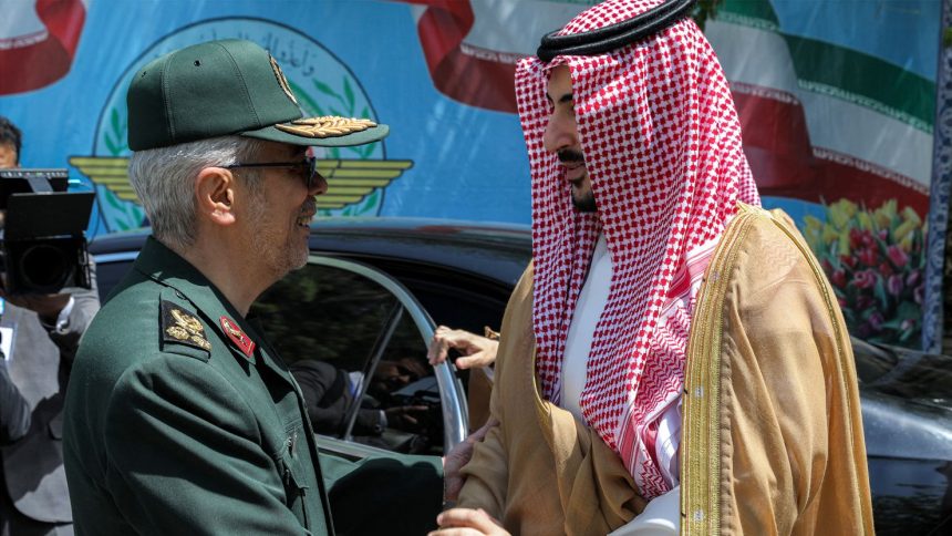 Iran's Armed Forces Chief of Staff Major-General Mohammed Bagheri (L) receiving Saudi Arabia's Defence Minister Prince Khalid bin Salman in Tehran on Thursday.