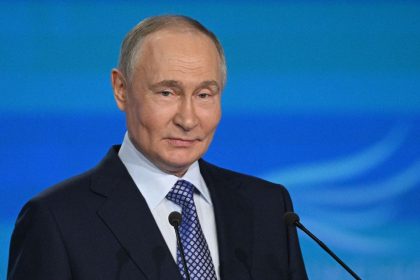 In this pool photograph distributed by the Russian state agency Sputnik, Russia's President Vladimir Putin attends a ceremony to present the "Sluzheniye" (Service) all-Russian municipal service awards in Moscow on April 21, 2025.