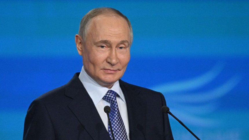 In this pool photograph distributed by the Russian state agency Sputnik, Russia's President Vladimir Putin attends a ceremony to present the "Sluzheniye" (Service) all-Russian municipal service awards in Moscow on April 21, 2025.