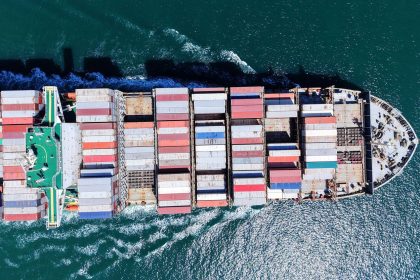A cargo ship carrying foreign trade containers departs from Qingdao Port of Shandong Port Group in Qingdao City, Shandong Province, China, on April 23.