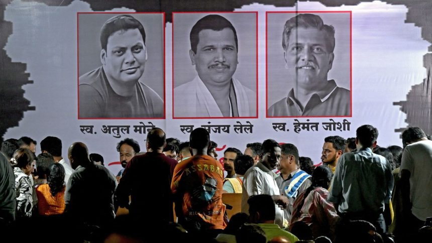 Mourners gather on April 23, 2025 to pay their homage to Atul Mone, Sanjay Lele and Hemant Joshi, who were killed by gunmen in Indian-administered Kashmir