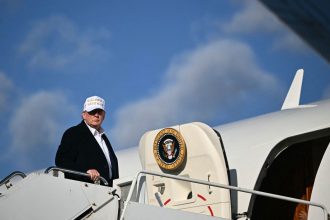 President Donald Trump boards Air Force One in Morristown, New Jersey, on April 27, 2025.