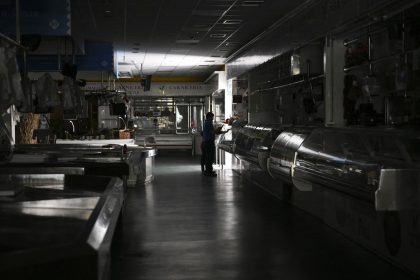 A market lies dark and abandoned in Vigo, northwestern Spain, on Monday.