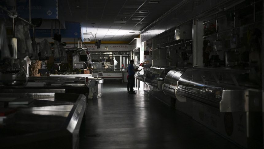 A market lies dark and abandoned in Vigo, northwestern Spain, on Monday.
