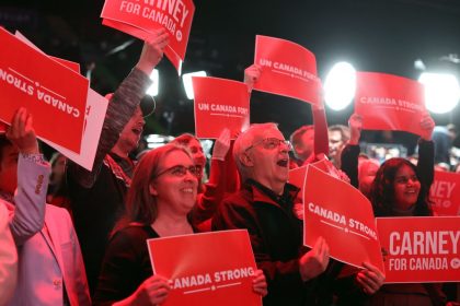 Supporters for Canada's Prime Minister and Liberal Party leader Mark Carney celebrate as results are announced during an election party in Ottawa, Canada April 28, 2025. Prime Minister Mark Carney's Liberals have won Canada's election on April 28, 2025, multiple media outlets projected, giving the party another term in power after a campaign defined by threats from US President Donald Trump. (Photo by Dave Chan / AFP) (Photo by DAVE CHAN/AFP via Getty Images)
