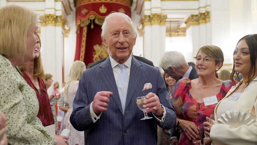 King Charles III speaks to guests during a reception in celebration of community-based initiatives raising awareness about cancer and supporting those living with cancer at Buckingham Palace on April 30, 2025 in London, England.