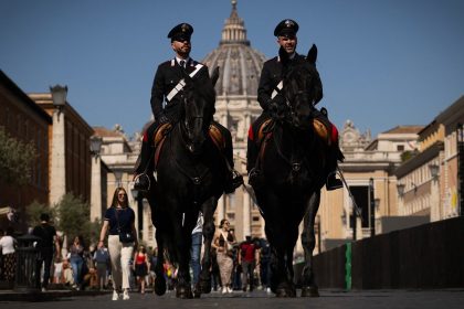 Italy's Carabinieri patrol near St Peter's square in The Vatican on May 1, 2025.