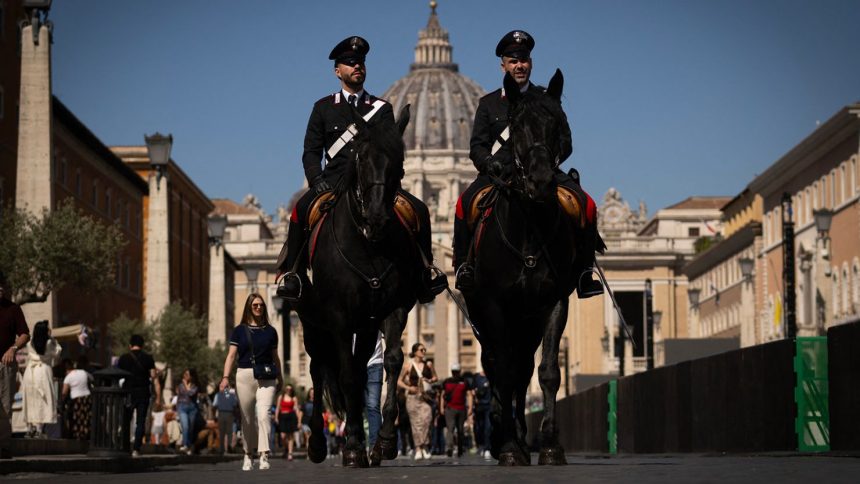 Italy's Carabinieri patrol near St Peter's square in The Vatican on May 1, 2025.