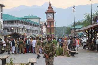 An Indian paramilitary soldier stands guard near the Clock Tower (Ghanta Ghar) in Srinagar, Jammu and Kashmir, on May 1, 2025.