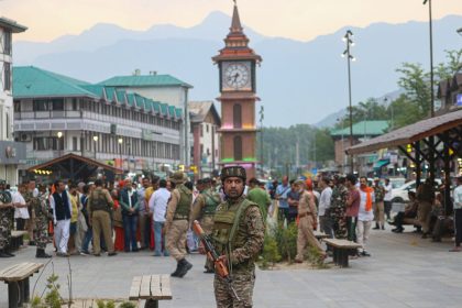 An Indian paramilitary soldier stands guard near the Clock Tower (Ghanta Ghar) in Srinagar, Jammu and Kashmir, on May 1, 2025.
