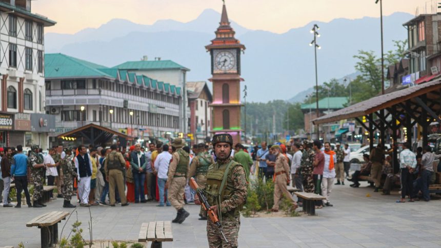 An Indian paramilitary soldier stands guard near the Clock Tower (Ghanta Ghar) in Srinagar, Jammu and Kashmir, on May 1, 2025.