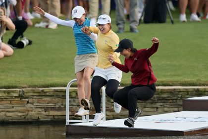 The moment Mao Saigo jumps in the pond with her team after winning the Chevron Championship.