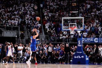 Jalen Brunson scores the game-winning three-pointer against the Detroit Pistons to send the Knicks into the second round of the NBA playoffs.