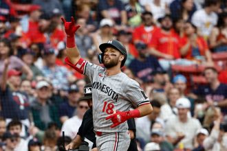 Kody Clemens signals to his parents as he rounds the bases after hitting his first ever Fenway Park home run.