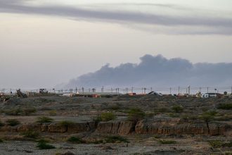 Smoke rises from the airport of Port Sudan, the seat of the Sudanese army-aligned government on the Red Sea coast, following reported attacks early on Sunday.