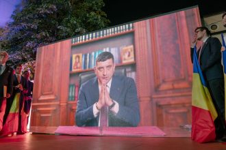 Presidential candidate George Simion gives a virtual address to his supporters after polls closed on Sunday in Bucharest, Romania.