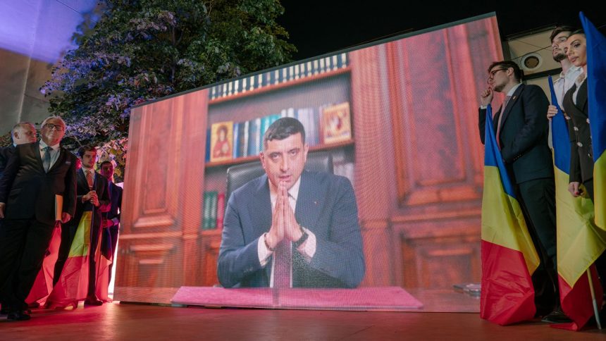 Presidential candidate George Simion gives a virtual address to his supporters after polls closed on Sunday in Bucharest, Romania.