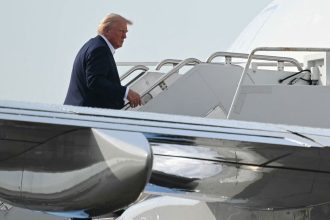 President Donald Trump boards Air Force One in West Palm Beach, Florida, on May 4, 2025.