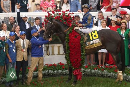 Sovereignty and jockey Junior Alvarado pose for pictures after winning the 151st running of the Kentucky Derby.