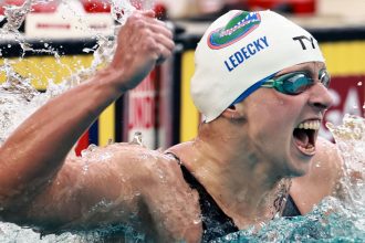 Katie Ledecky set her first world record in seven years on Saturday.
