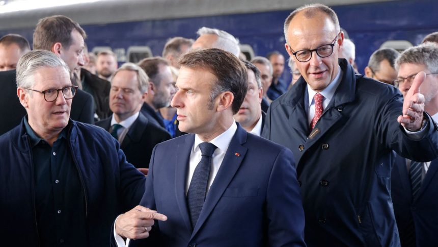 Britain's Prime Minister Keir Starmer, France's President Emmanuel Macron and Germany's Chancellor Friedrich Merz arrive at Kyiv railway station on May 10, 2025.