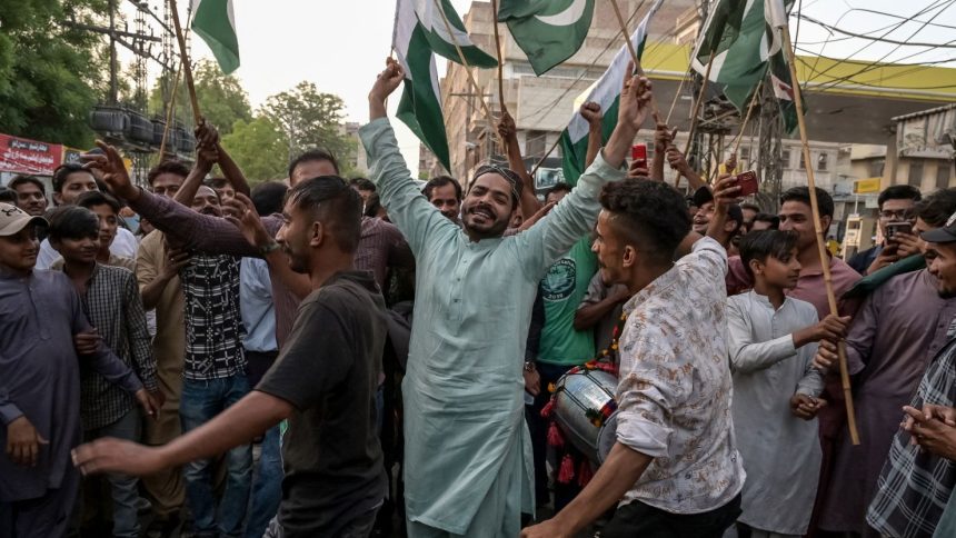 People in Hyderabad, Pakistan, celebrate after the announcement of the ceasefire between Pakistan and India on May 10.