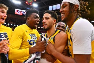 Tyrese Haliburton (center) hit a game-winning three-pointer to lift the Indiana Pacers over the Cleveland Cavaliers in Game 2 of the Eastern Conference semifinals.