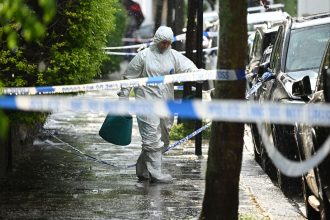 Police forensics officers near the home of UK Prime Minister Keir Starmer on May 12, 2025 in London, England.