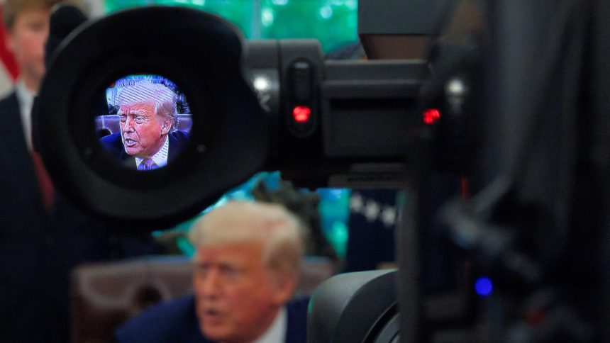 US President Donald Trump talks to reporters after signing several congressional resolutions into law in the Oval Office at the White House in Washington, DC, on May 9.