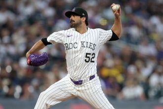 Pitcher Scott Alexander of the Colorado Rockies throws against the San Diego Padres in the sixth inning.