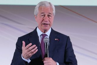JPMorgan Chase CEO Jamie Dimon delivers a speech at the Global Markets Conference. He has said he continues to fear that higher tariffs will usher in a recession.