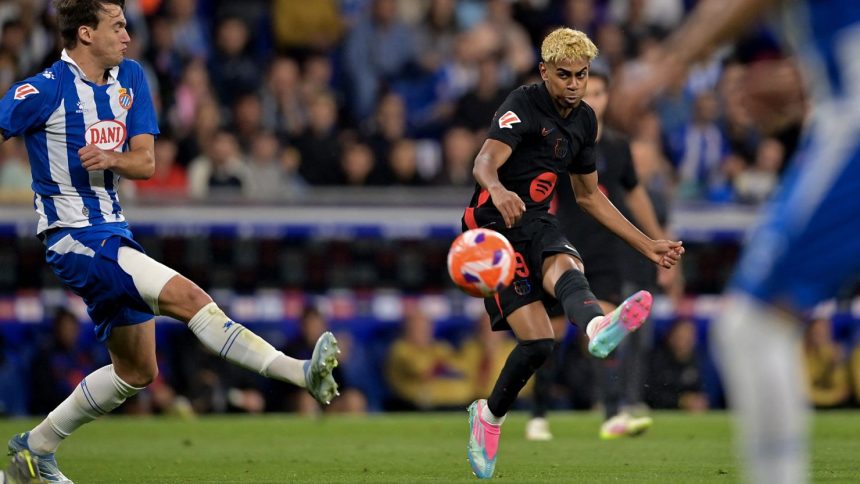 Lamine Yamal scores Barcelona's first goal against Espanyol on Thursday.