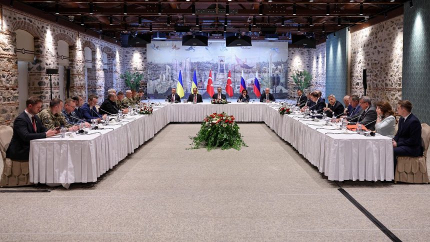 Turkish Foreign Minister Hakan Fidan, center, chairs a trilateral meeting between Turkey, Russia and Ukraine in Istanbul on May 16.