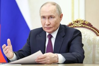 Russia's President Vladimir Putin chairs a meeting in Moscow on May 22.