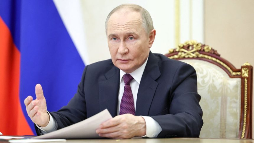 Russia's President Vladimir Putin chairs a meeting in Moscow on May 22.