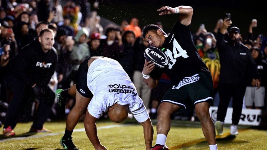 Players collide with each other in the final of the RUNIT Championship League in Auckland, New Zealand.