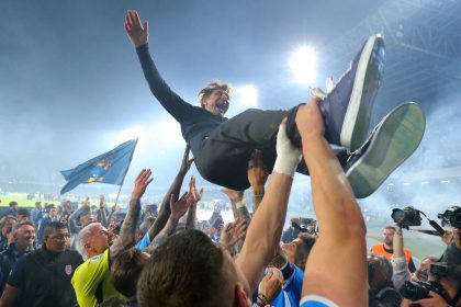 Napoli manager Antonio Conte was thrown into the air by his players.