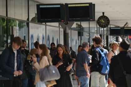 People waiting at a station after a significant power outage was reported by local authorities in Alpes-Maritimes in France on May 24, 2025.