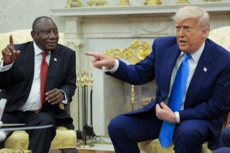 WASHINGTON, DC - MAY 21: U.S. President Donald Trump (R) speaks during a meeting with President of South Africa Cyril Ramaphosa in the Oval Office of the White House on May 21, 2025 in Washington, DC. Relations between the two countries have been strained since Trump signed an executive order in February that claimed white South Africans are the victims of government land confiscation and race-based “genocide” while admitting some of those Afrikaners as refugees to the United States. Trump also halted all foreign aid to South Africa and expelled the country’s Ambassador to the U.S. Ebrahim Rasool. (Photo by Chip Somodevilla/Getty Images)