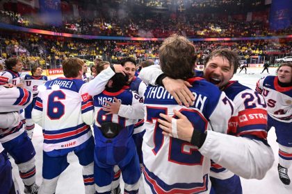 Team USA players celebrate after winning the IIHF World Championship against Switzerland in Stockholm, Sweden.