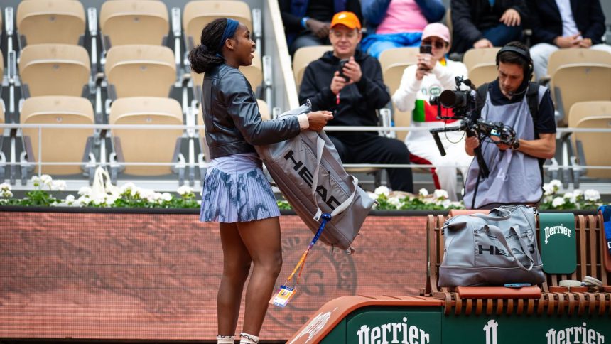 Coco Gauff realizes her racket bag is empty before playing Olivia Gadecki in the French Open first round.