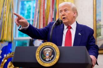 President Donald Trump takes a question during a swearing in ceremony for interim US Attorney for Washington, DC Jeanine Pirro in the Oval Office of the White House on May 28.