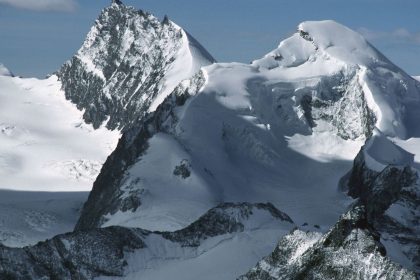 The snow-capped peaks of Rimpfischhorn (left) and Allalinhorn in the Valais Alps, Switzerland.